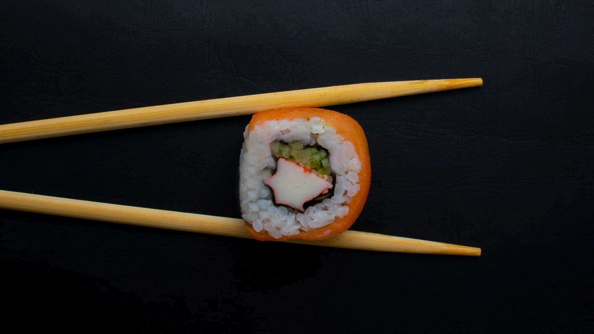 Sushi between two chopsticks