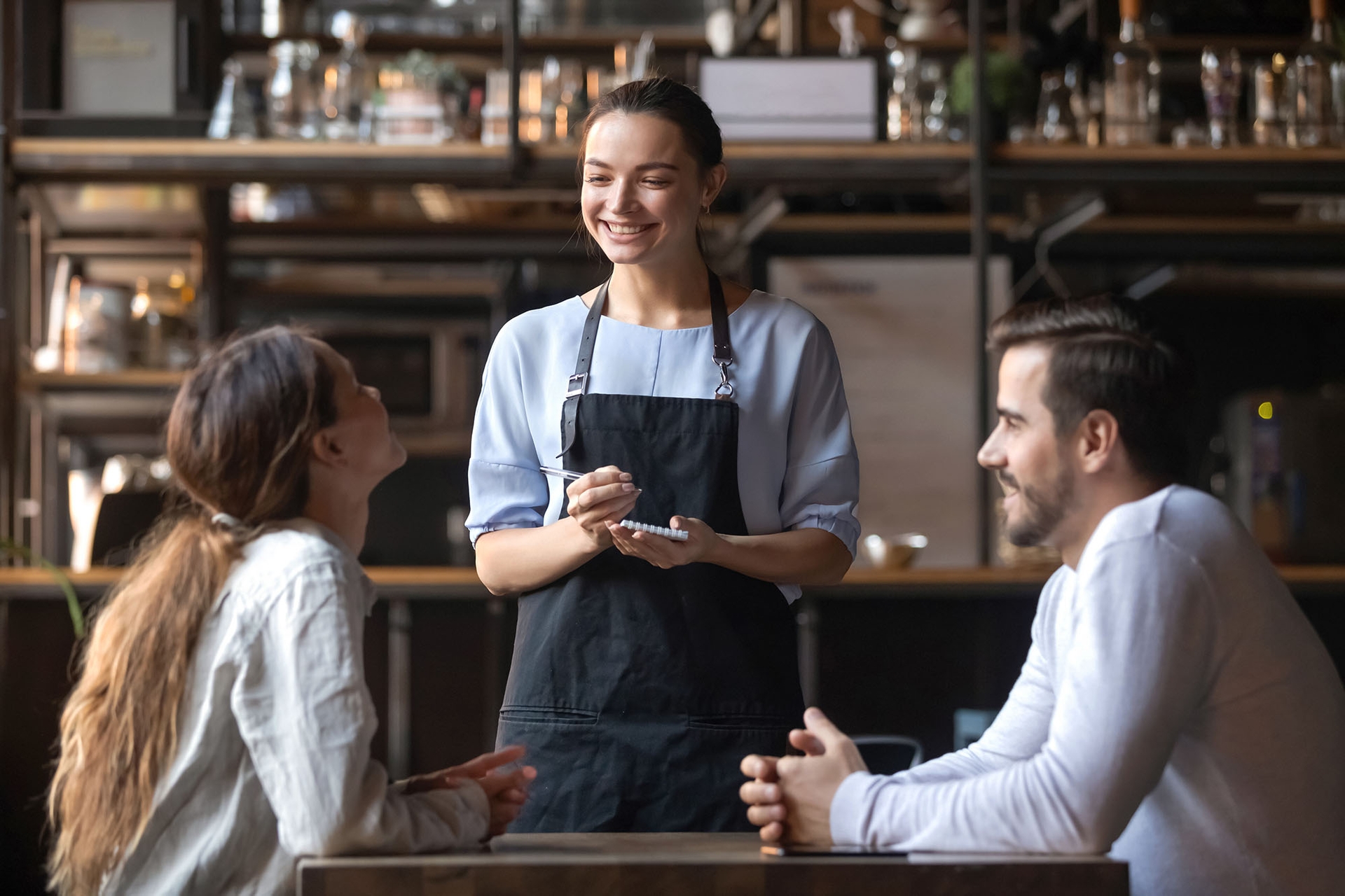 Waitress taking order