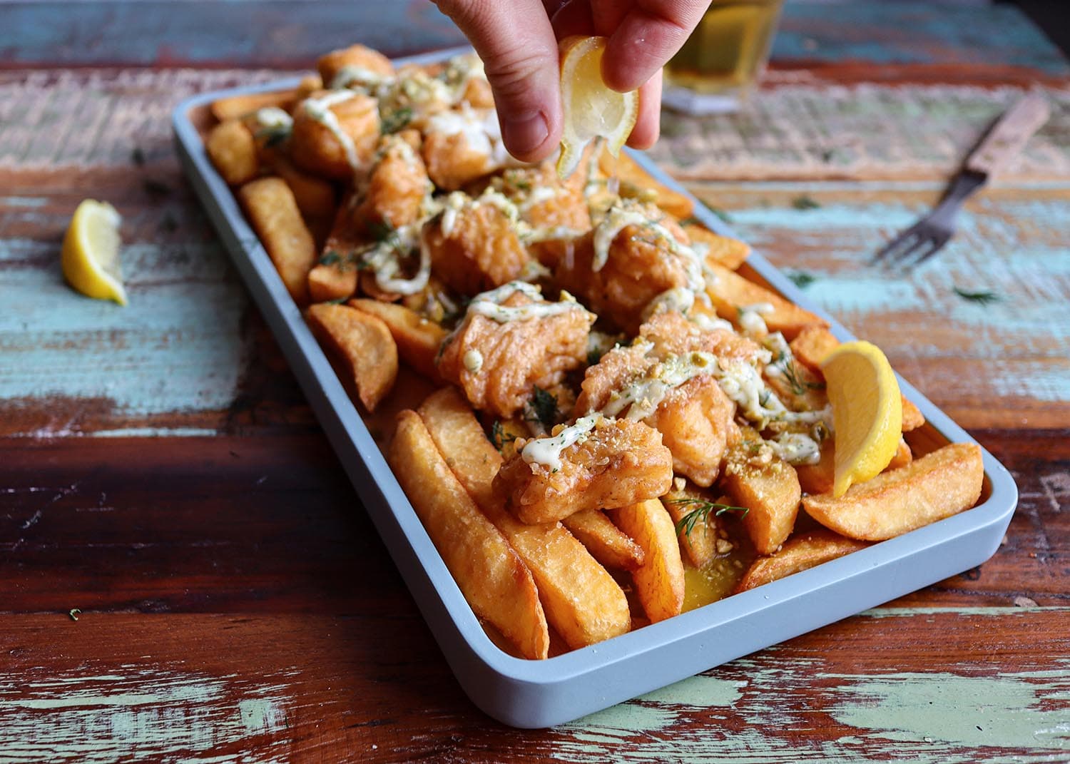Tempura-battered monkfish chunks with katsu curry sauce, yuzu kosho tartar sauce and crushed wasabi peas on SuperCrunch 18mm Chips.